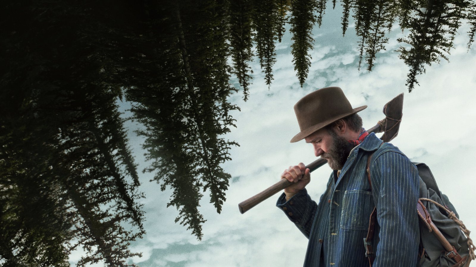 Pôster oficial de 'Sonhos de Trem', drama contemplativo dirigido por Clint Bentley e estrelado por Joel Edgerton, que transforma a passagem do tempo em paisagem e memória - Foto: Divulgação/Netflix